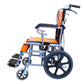 Pediatric Wheelchair orange  and black with handel brakes.